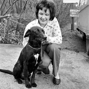Christine Smith with dog. March 1975 75-01222