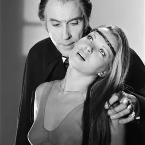 Christopher Lee, being photographed for poster, dressed as character Dracula in film Christopher Lee, being photographed for poster, dressed as character Dracula in film