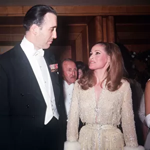 Christopher Lee & Ursula Andress pictured arriving at Royal premiere of film Born Free