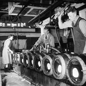 Cider being kegged at the Bulmers Cider Mill in Plough Lane, Hereford. Circa 1959