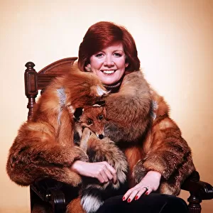 Cilla Black singer and entertainer wearing fox fur coat Circa 1985