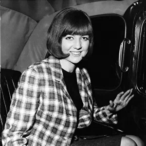 Cilla Black TV Personality and former pop star inside a taxi May 1964
