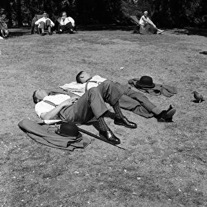 City gents sunbathing in London. 1st July 1957