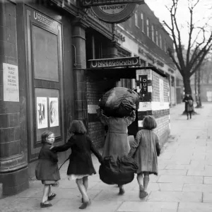 Civilians take shelter in an underground station. March 1943 Civilians take shelter in an underground station. March 1943
