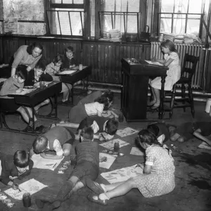Class Four of Steward Street School Birmingham seen here having an art lesson