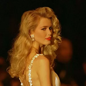 Claudia Schiffer Supermodel models a white dress by Valentino designer for the Paris