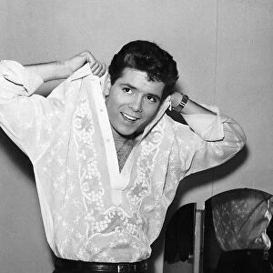 Cliff Richard Actor / Singer wearing a shirt made from pineapple leaves. June 1961