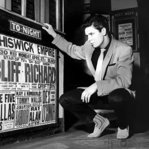 CLIFF RICHARD LOOKING AT CONCERT POSTER WITH HIS NAME AS TOP-BILLING - 1958 CLIFF RICHARD LOOKING AT CONCERT POSTER WITH HIS NAME AS TOP-BILLING - 1958