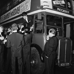 Cliff Richard and some of the Shadows with a hired London Transport bus Cliff Richard and some of the Shadows with a hired London Transport bus