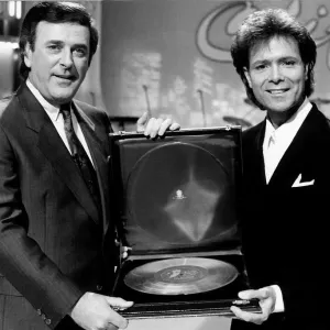 Cliff Richard Singer Actor with Terry Wogan receiving award Cliff Richard Singer Actor with Terry Wogan receiving award