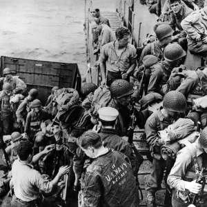 Climbing out of an LCVP (Landing Craft, Vehicle Personnel) U Climbing out of an LCVP (Landing Craft, Vehicle Personnel) U