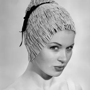 Clothing Beach: Fringe Tiered. This cap is made of tiers of fringe Clothing Beach: Fringe Tiered. This cap is made of tiers of fringe