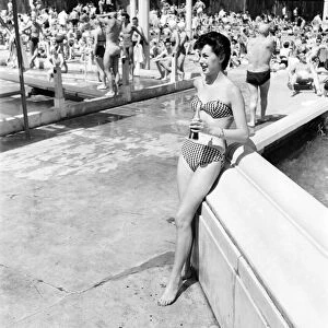 Clothing Beachwear. Jase Mills modelling bikini. July 1953 D3467