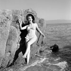 Clothing: Fashion: Beachwear: Holidaymakers: Bathing: Beauties seen here cooling off in