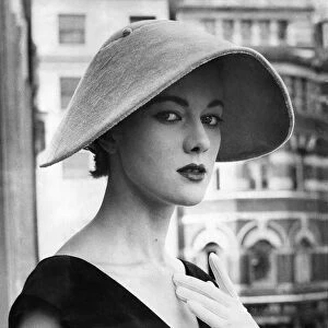 Clothing-Fashion: Hats: Bloching hats: Velnet collie hat by Ronald Peterson. July 1954