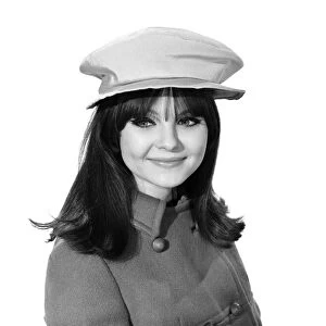 Clothing: Fashion: Hats. Model: Joanne Young. 1966 B2077-004