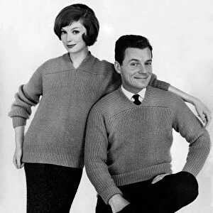 Clothing: Fashion: Knitwear. Couple wearing matching jumpers. October 1959 P013234