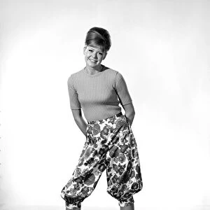 Clothing: Fashion: Trousers: Model wearing floral pattern pants. 1966