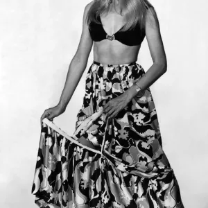 Clothing Fashions: Now with a quick tug the flounce pulls off. July 1970