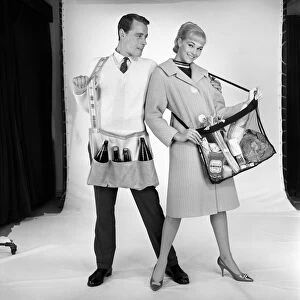 Clothing: Man and woman wearing matching aprons. 1960 B1255-004