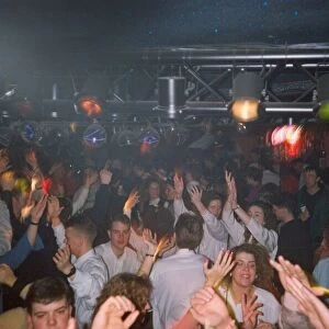 Clubbers get hot and sweaty enjoying a rave