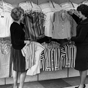 Co-op 1963 Fashion department women looking at blouses Circa 1963