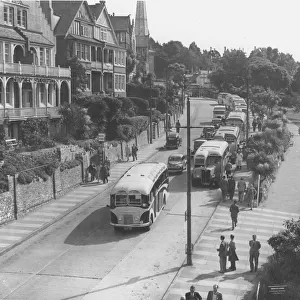 Coaches line up along the Babbacombe Road, Torquay in June 1953