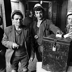 Coal miners cast their votes during the election. October 1977 P005132