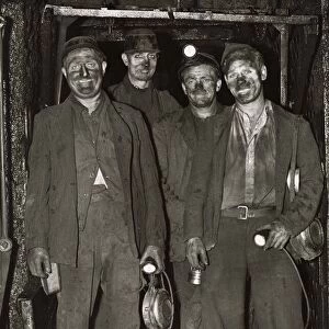 Coal Miners return to the surface after a hard day digging for coal in the mines