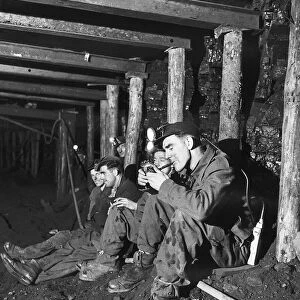 Coal Miners stopping for a cigarette break at the Whitehill Colliery 1947