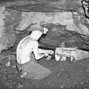 Coal miners working at the coal face in the Somerset coalfields, March 1946 OP403B