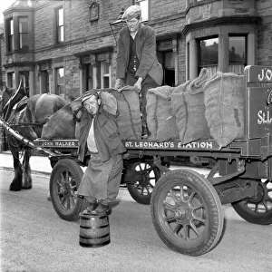Coalman delivering coal. May 1958 A687-003