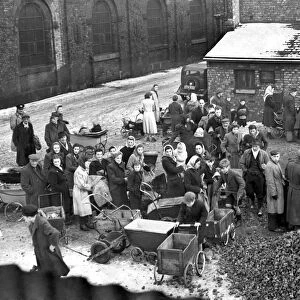 Coke Queue Manchester. People queue for coke at Gaythorne Gas works