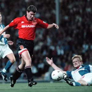 Colin Hendry tackle moments before dive by Roy Keane Manchester United Player who was Colin Hendry tackle moments before dive by Roy Keane Manchester United Player who was