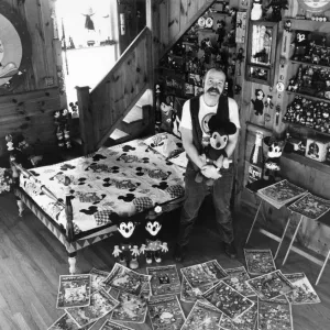 Collection - Mickey Mouse mania. Assistant Professor John Fawcett at his home Collection - Mickey Mouse mania. Assistant Professor John Fawcett at his home