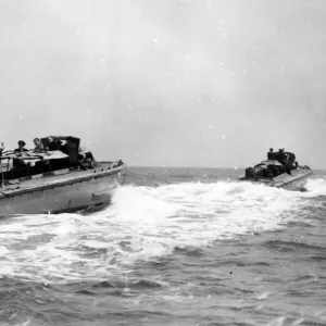 Combined operations exercises. Section of a landing craft flotilla setting off during