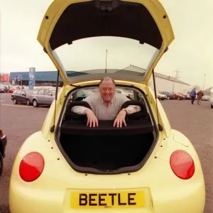 Comedian Andy Cameron April 1999 sitting inside a Volkswagen Beetle Comedian Andy Cameron April 1999 sitting inside a Volkswagen Beetle