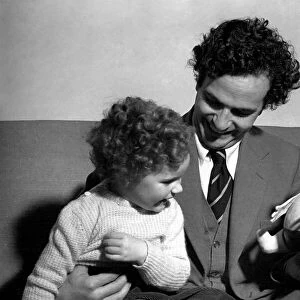 Comedian Michael Bentine seen here with a Bumble puppet and his son Gus