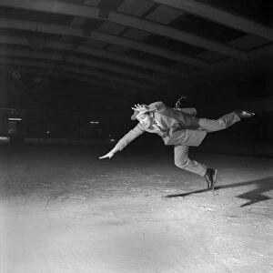 Comedian Norman Wisdom on ice. October 1953 D6365-004