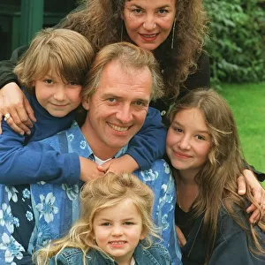 Comedian Rik Mayall and his family, wife Barbara and three children, Rosie