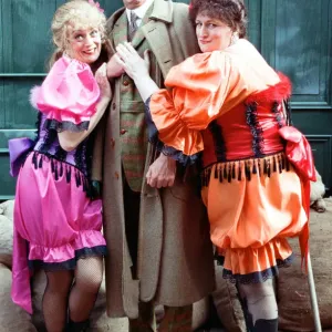Comedian Russ Abbott dressed as Sherlock Holmes flanked by Sherrie Hewson (left