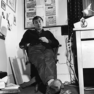 Comedian Spike Milligan asleep at his desk 1958 A©mirrorpix