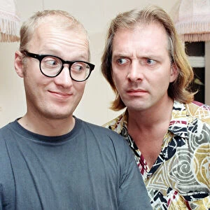 Comedians Ade Edmondson and Rik Mayall, actors who star in the television series "