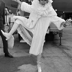 Comedienne Phyllis Diller seen here arriving at London