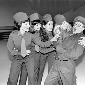 Comedy actor Arthur Lowe of Dads Army surrounded by girls