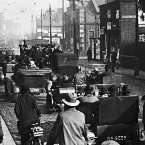 Commuters using makeshift public transport during the General strike of 1926