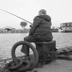 Print of a fisherman at Surrey Docks, London, 1977 Print of a fisherman at Surrey Docks, London, 1977