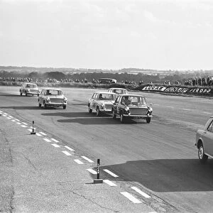 Competitors in the Molyslip Morris 1100 race at Snetterton race track in Norfolk