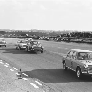 Competitors in the Molyslip Morris 1100 race at Snetterton race track in Norfolk Competitors in the Molyslip Morris 1100 race at Snetterton race track in Norfolk