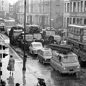 Congestion around a wet Earls Court in London where the 1959 Motor Show is taking place